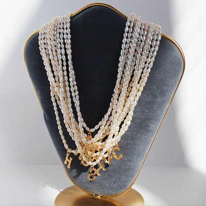 Natural freshwater rice grain pearl necklace elegant retro bamboo texture 26 English letter pendant collarbone chain