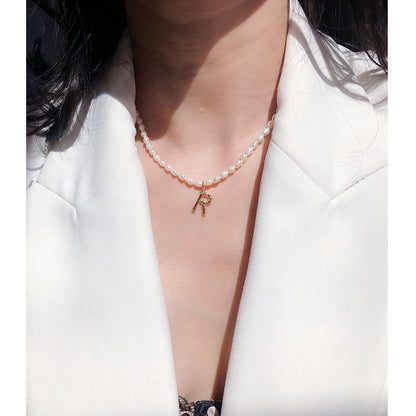 Natural freshwater rice grain pearl necklace elegant retro bamboo texture 26 English letter pendant collarbone chain